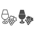 Wine glass and a bunch of grapes line and solid icon. Full wineglass and grape with leaf outline style pictogram on Royalty Free Stock Photo