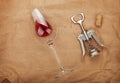 Wine glass, cork and corkscrew with red wine stains Royalty Free Stock Photo