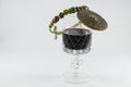 Wine glass with jeweled cap