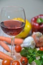 Wine glass red vegetable fresh food garlic tomato carrots onion pepper Royalty Free Stock Photo
