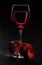 Wine glass with ribbon on black Royalty Free Stock Photo