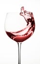Wine glass, splash of wine red water Royalty Free Stock Photo