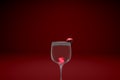 Wine glass on top with cherry in red background. 3D rendering