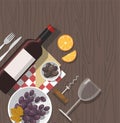 Wine glass, wine bottle,olives and grapes on wooden background. Wine tasting.