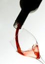 Wine glass and wine puring from bottle as Valentin Royalty Free Stock Photo