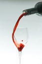 Wine glass and wine puring from bottle as Valentin Royalty Free Stock Photo