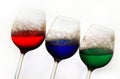 Wine glasses colored water Royalty Free Stock Photo