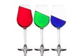 WIne glasses with different coloured drinks. Three different colored wine glasses isolated on white. Red, green and blue - RGB Royalty Free Stock Photo