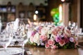 Wine glasses in the foreground. Wedding Banquet or gala dinner. The chairs and table for guests, served with cutlery and Royalty Free Stock Photo