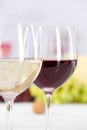 Wine glasses glass white red grapes portrait format Royalty Free Stock Photo