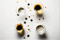Wine glasses with golden confetti and black stars on white background. Holidays, celebration concept. Flat lay, top view. AI Royalty Free Stock Photo