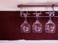 Wine glasses hanging up side down. Royalty Free Stock Photo