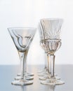 Decoration setup of wine and martini glasses set on a reflective table top