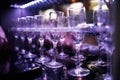 Wine glasses in shelf above a bar rack in restaurant Royalty Free Stock Photo