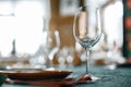 Wine glasses and table serving in rustic style restaurant Royalty Free Stock Photo