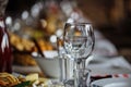 Wine glasses and table setting in restaurant Royalty Free Stock Photo