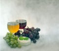 Wine grapes and cheese Royalty Free Stock Photo