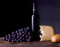 Wine, grapes, cheese and bread Royalty Free Stock Photo