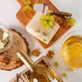 Wine, grapes, cheese and nuts. Top view Royalty Free Stock Photo
