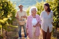 Wine and grapes. Family tradition. Harvesting grapes. mother and daughter on autumn vineyard