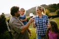 Wine grower family in vineyard