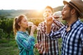 Wine growers tasting wine in vineyard Royalty Free Stock Photo