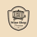 Wine logo.Vector winery sign with wooden barrel.Typographic label, badge with hand sketched keg for restaurant,bar menu. Royalty Free Stock Photo