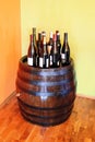 Wine over wood barrel Royalty Free Stock Photo