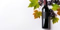 Wine Presentation With Grapes And Seasonal Leaves. Bottle And Grapes With Autumn Leaves On White Background. Generative AI Royalty Free Stock Photo