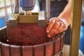 Wine press being used in the process of wine-making