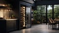 Wine refrigerator in the interior of a black kitchen Royalty Free Stock Photo