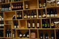 Wine shop. Wooden shelves with exposed Tuscan red wines.