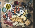 Wine and snack set with wines, meat, bread, olives, fruits Royalty Free Stock Photo