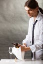 Wine steward fills glass. Royalty Free Stock Photo