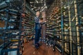 A male client choosing wina in a wine store Royalty Free Stock Photo