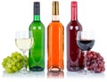 Wine tasting bottle red and white rose green grapes isolated Royalty Free Stock Photo