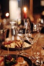 Wine tasting experience in the rustic cellar and wine bar: red wine glass and collection of excellent wines on the