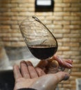 wine tasting glass in the hands of a woman in vinicola winery still life Royalty Free Stock Photo