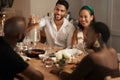 Wine, toast and party with friends at table of dining room for new year celebration, festive and social gathering. Drink Royalty Free Stock Photo