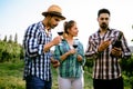 Wine tourists tasting wine in vineyard Royalty Free Stock Photo