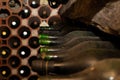 Wine Vault. Dusty bottles of old wine on stone shelves