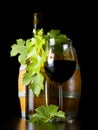 Wine and wine-bearing grape leaves. Royalty Free Stock Photo