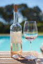 Wineglass, alcohol, winebottle, drinkglass, pool, glass of bourbonrose, wine Royalty Free Stock Photo