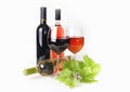 Wineglass, bottle of wine, grapes leaf Royalty Free Stock Photo