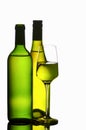 Wineglass and bottles Royalty Free Stock Photo