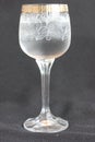 Wineglass with cold water, damp from settled vapors 0082