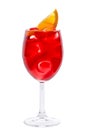 Wineglass with red fruit coctail close-up