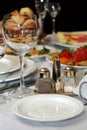 Wineglass, salt and pepper in restaurant Royalty Free Stock Photo