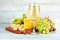 Wineglass white wine with fruits nut