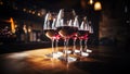 Wineglasses with red and rose wines on bar counter in restaurant Royalty Free Stock Photo